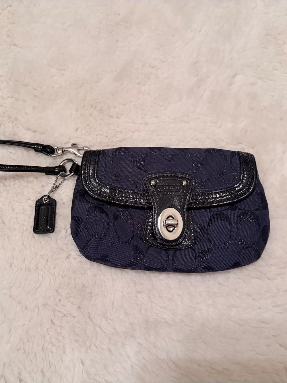 Coach Navy Signature Wristlet with Black Trim and Silver Turnlock